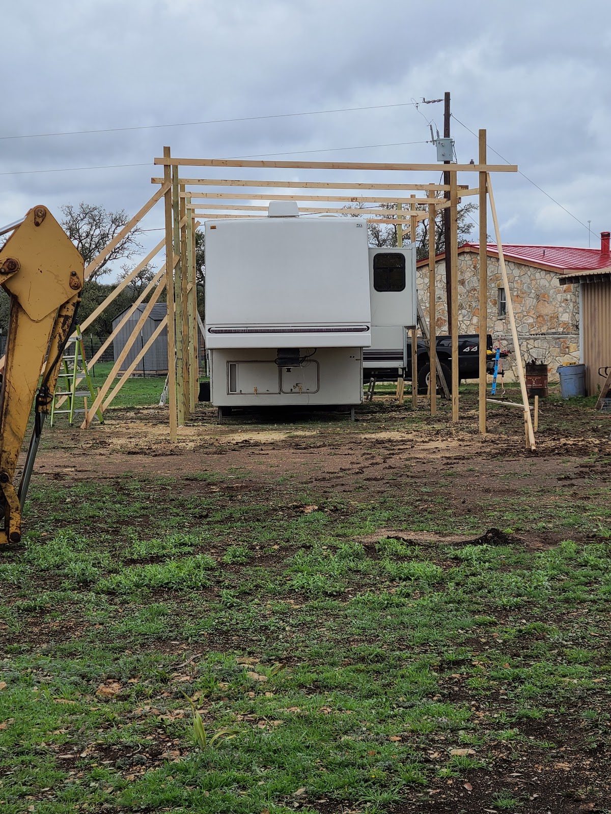 Structural exterior framing with heavy equipment